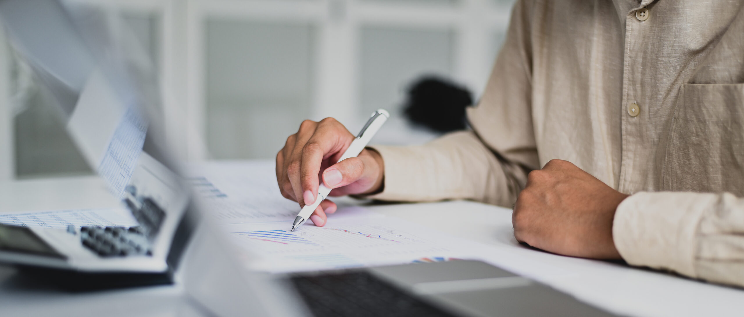 Cropped shot of Accountant checking company data graph, auditing, data analysis.